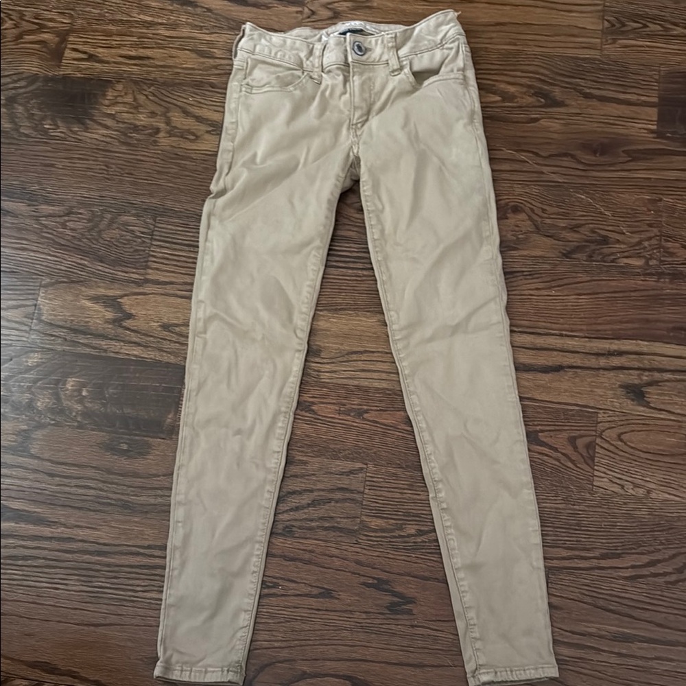 American Outfitters super stretch khaki jeggings. School uniform pants 0